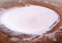 Stunning Photos Show Huge Crater on Mars Absolutely Brimming With Water Ice